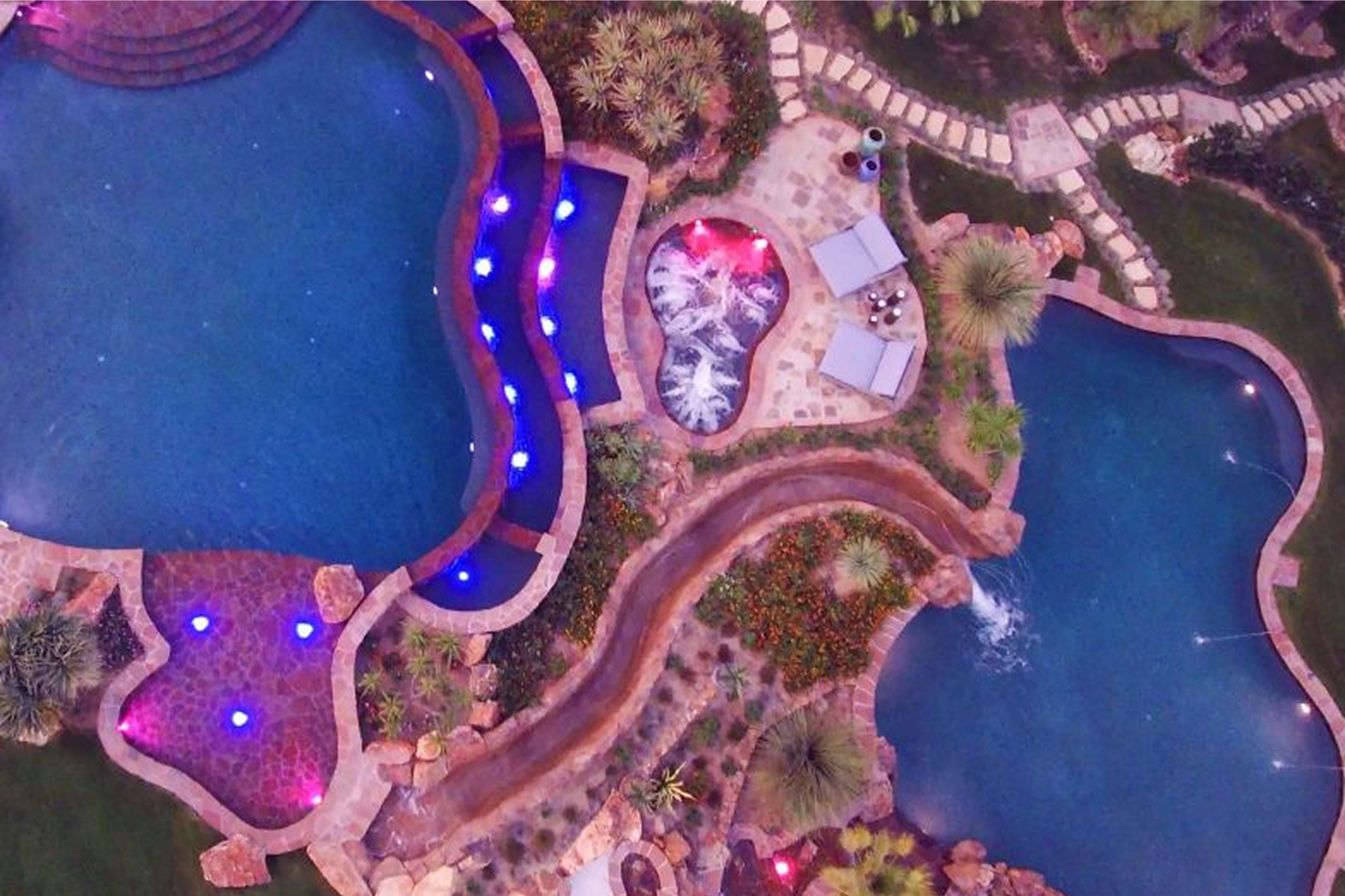 A birds eye view of a luxury swimming pool