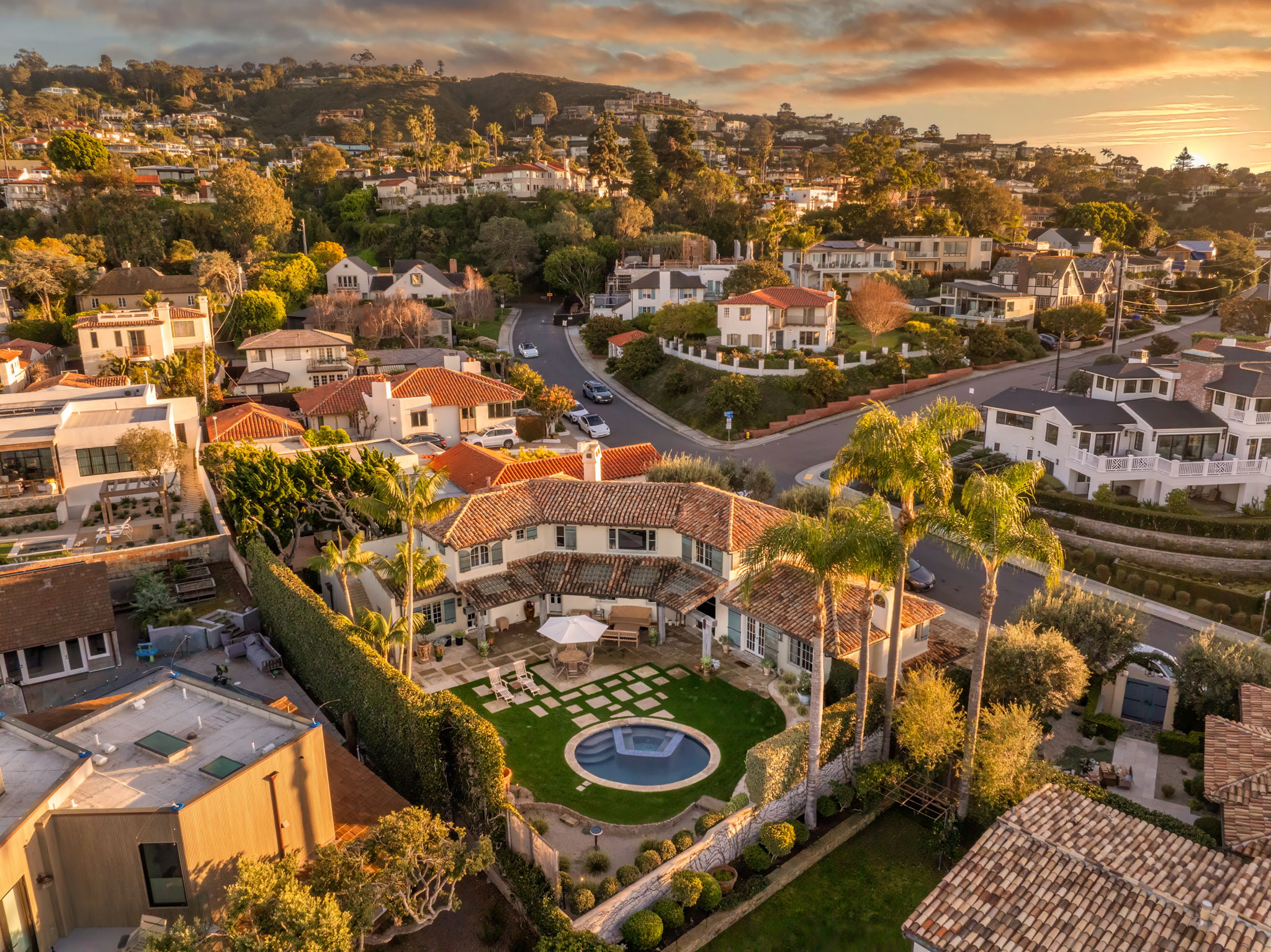 Aerial view of residential property with inground spa in Southern California