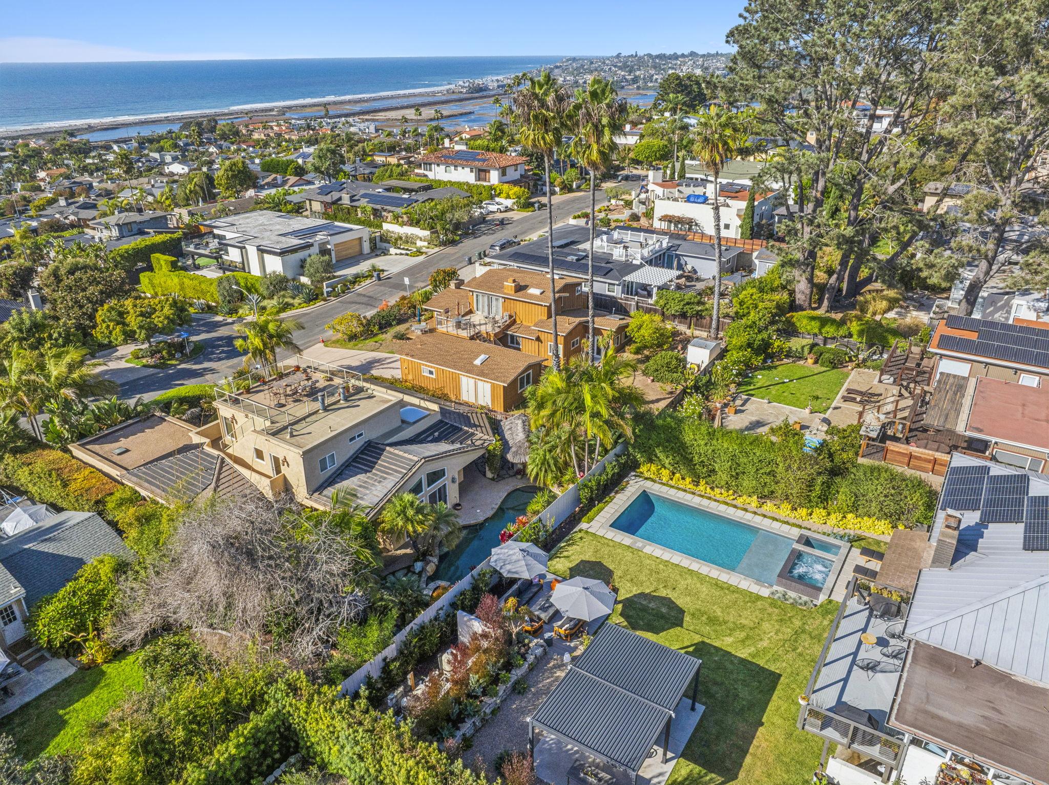 Aerial view of coastal Southern California home with luxury pool