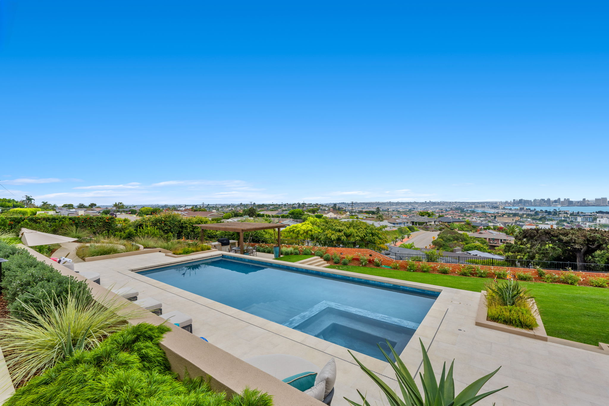 Modern pool remodel with updated deck and landscaping in Southern California