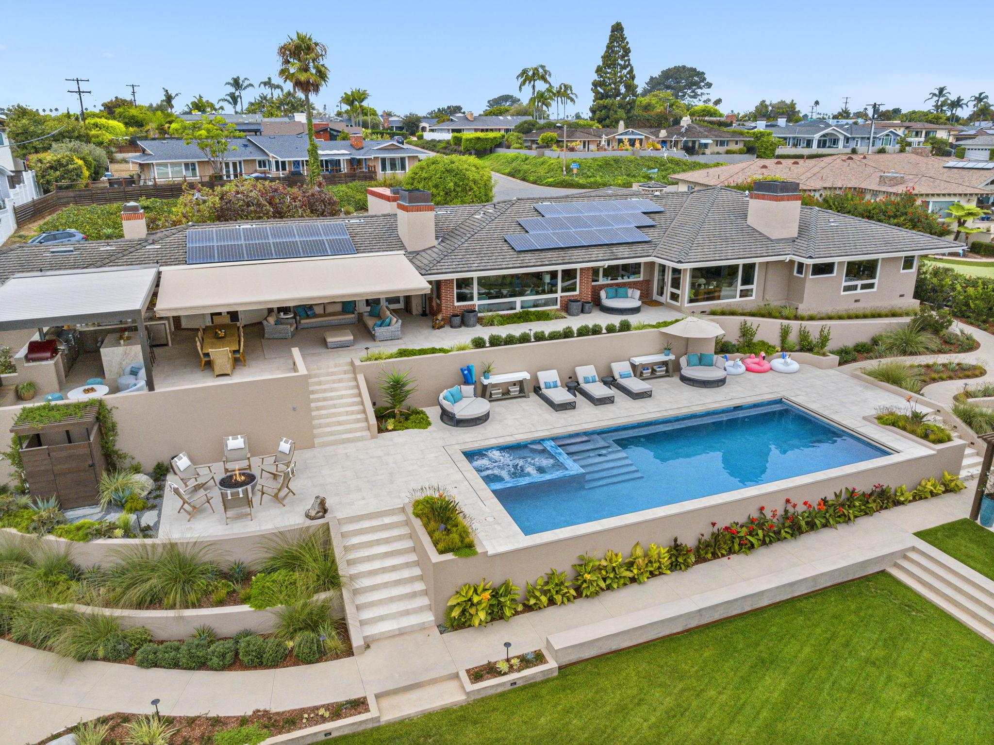 Mission Pools pool build with maintained deck and landscaping in Southern California