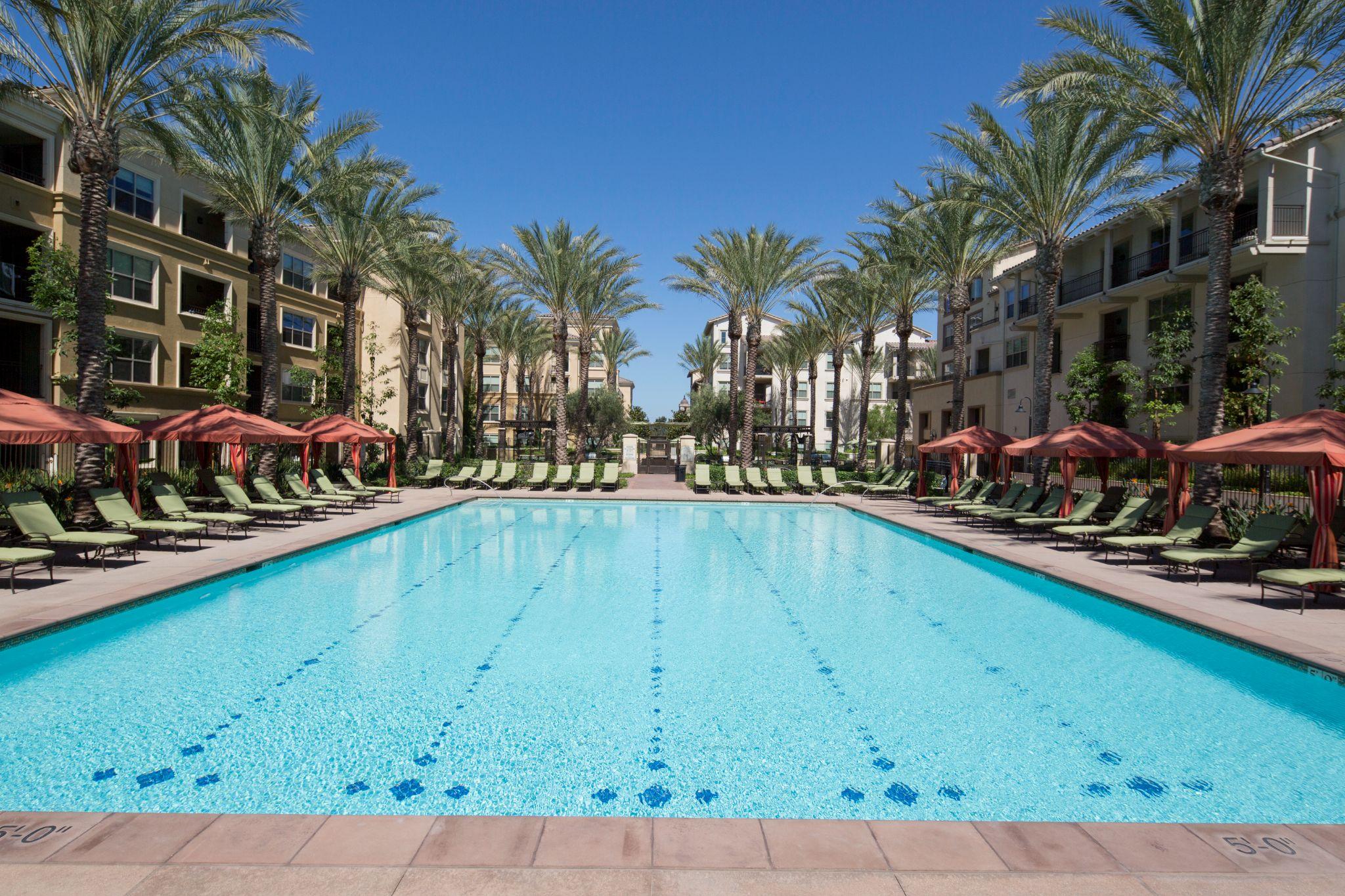Pool with attached spa at sunset, the kind of year-round setup that benefits from the right pool heater options for SoCal climates